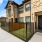 a gated yard to a building