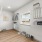 a closet with shelves and a window