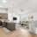 a kitchen with a couch and a table