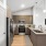a kitchen with a stove and refrigerator