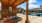 poolside pergola with lounge chairs